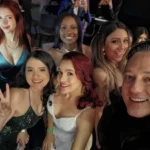 Equipo de Team Amín compartiendo con streamers durante un encuentro